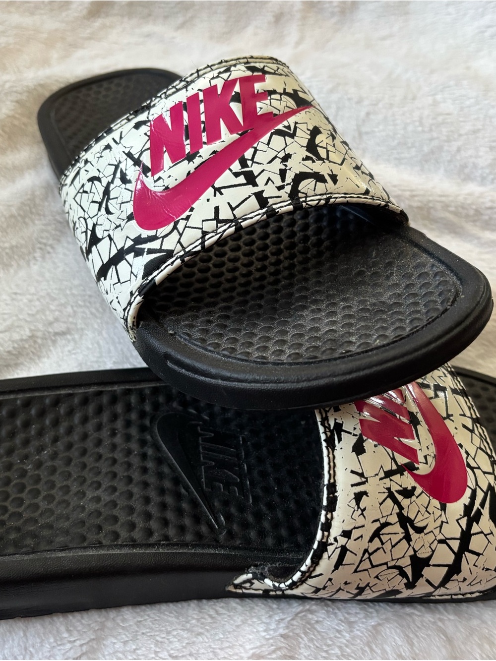 Nike Black & White Slide Sandals with Pink Logo